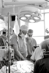 medical team performing surgery in operating room