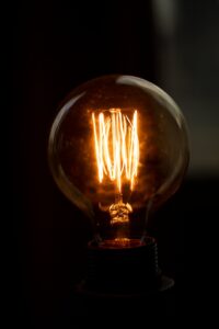 lighted clear light bulb
