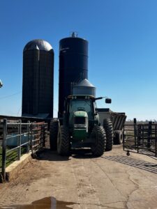 farm tractor pulling a load